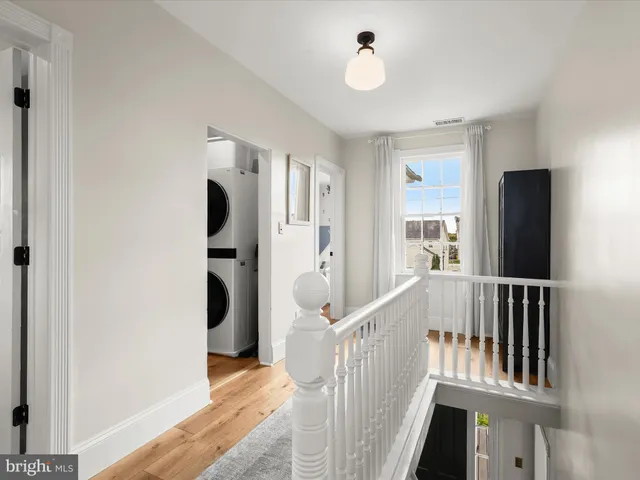 a view of a house with a yard and a garden