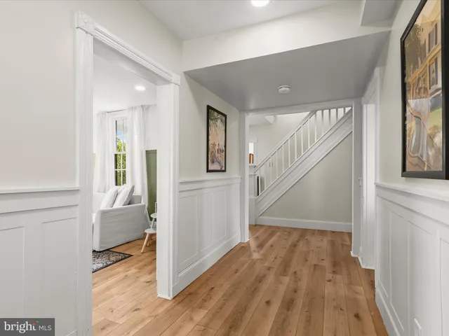 a view of entryway with wooden floor
