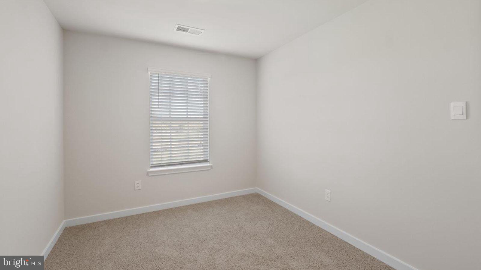 7521 Silver Thread Way Brandywine, MD 20613 - Photo 29 of 39 an empty room with a window