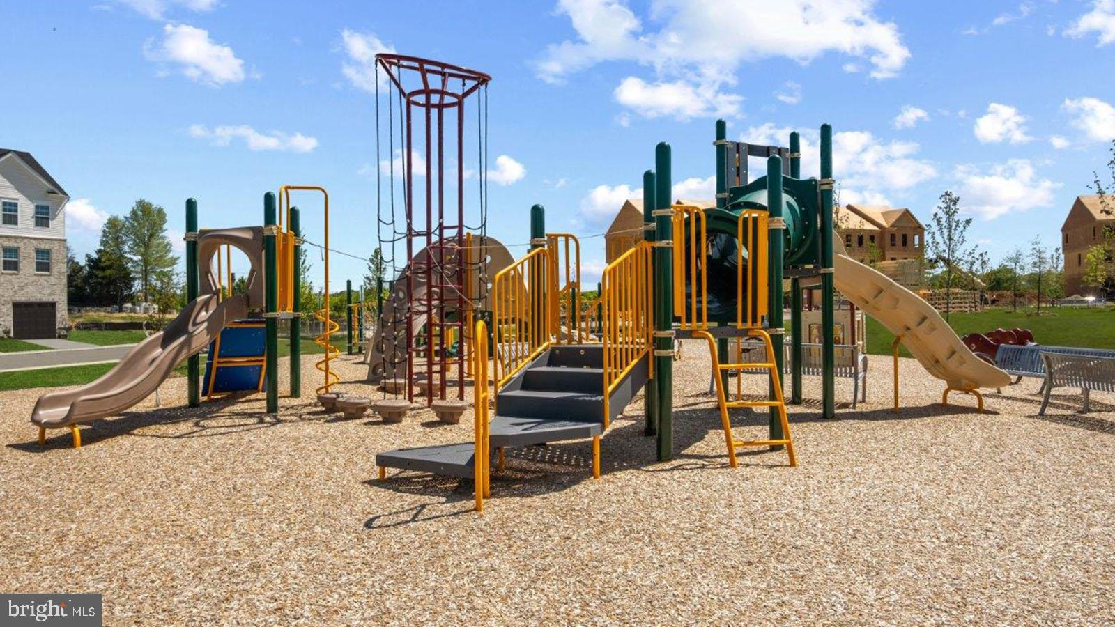 7521 Silver Thread Way Brandywine, MD 20613 - Photo 38 of 39 a view of a park with swings and slides