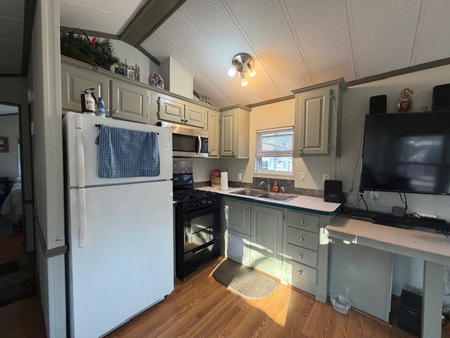 2795 East 28th Road Marseilles, IL 61341 - Photo 7 of 55 a kitchen with stainless steel appliances a microwave a sink and a refrigerator