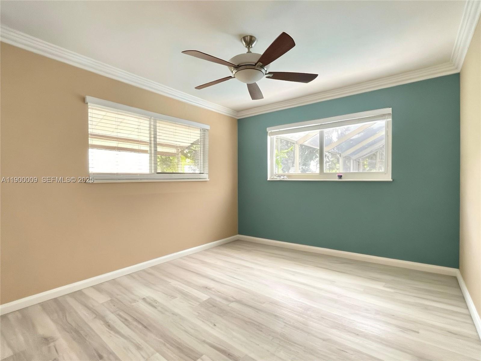 10220 Southwest 160th Street, Unit 10220 Miami, FL 33157 - Photo 2 of 57 a view of an empty room with a window