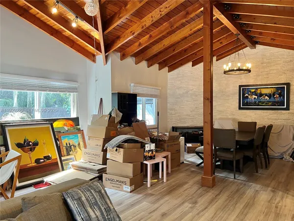 a view of a living room with furniture