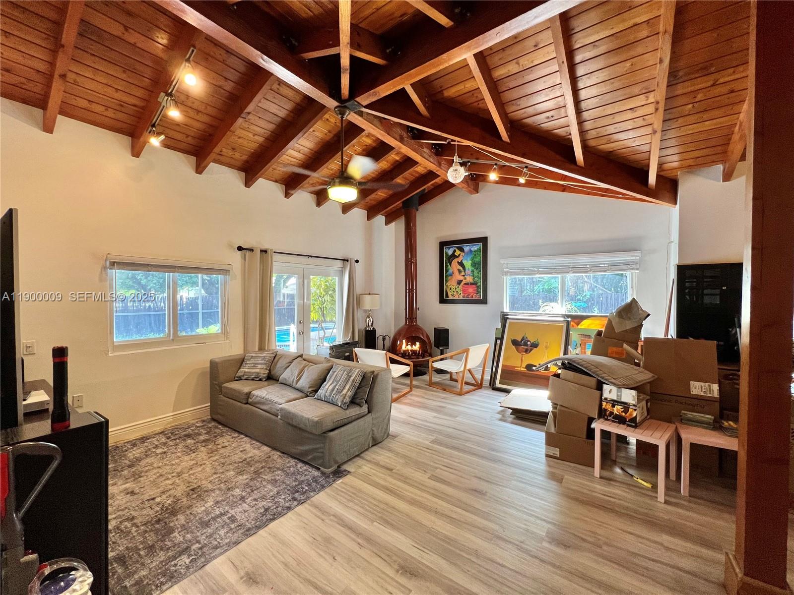 10220 Southwest 160th Street, Unit 10220 Miami, FL 33157 - Photo 38 of 57 a living room with furniture or wooden floor and a large window