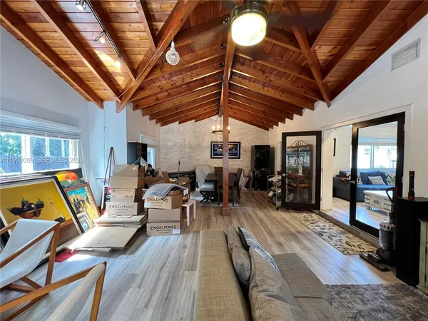 a view of a chair and table in the patio