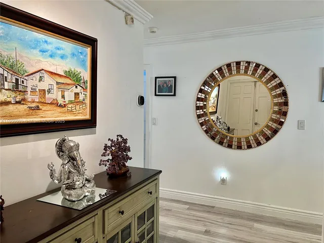 a front view of a house with wooden floor