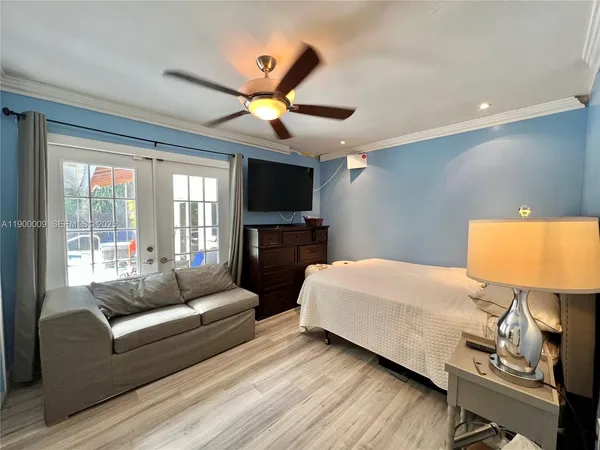 a view of gallery with wooden floor