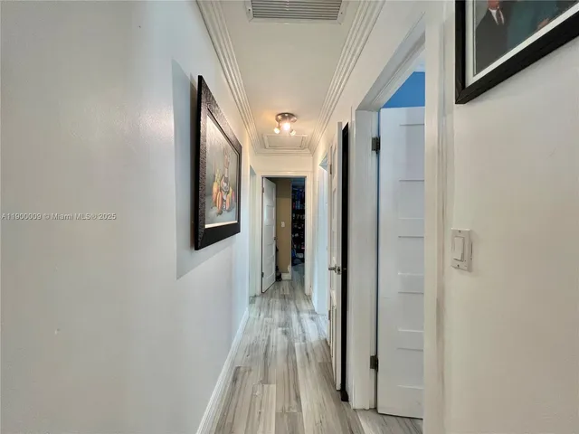 a bed room with a bed and a tv