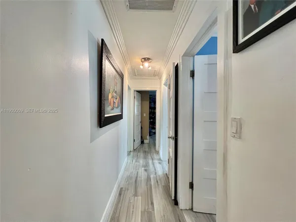 a bed room with a bed and a tv