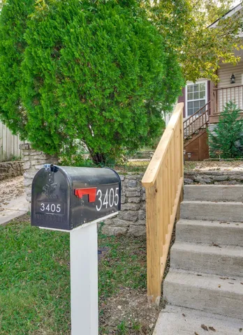 a view of sign board with yard