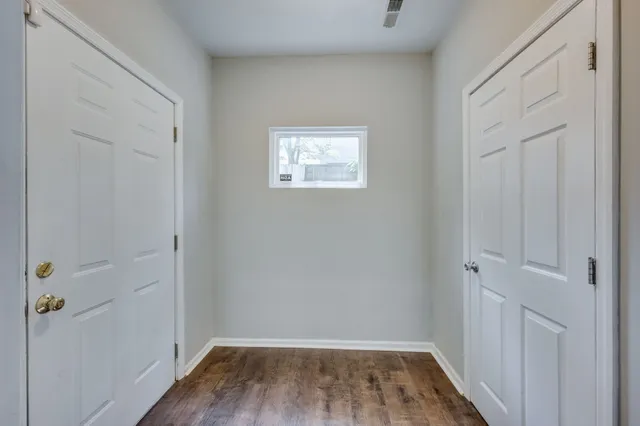 a view of a kitchen with a washer and dryer