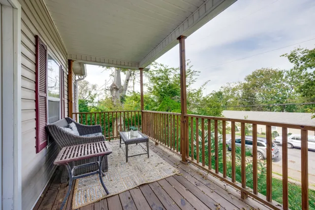 a view of a two chairs with a balcony