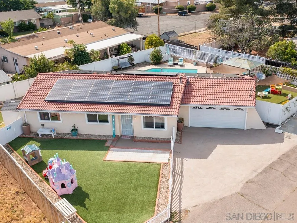 13730 Somerset Road Poway, CA 92064 - Photo 1 of 24 a front view of a house with garden