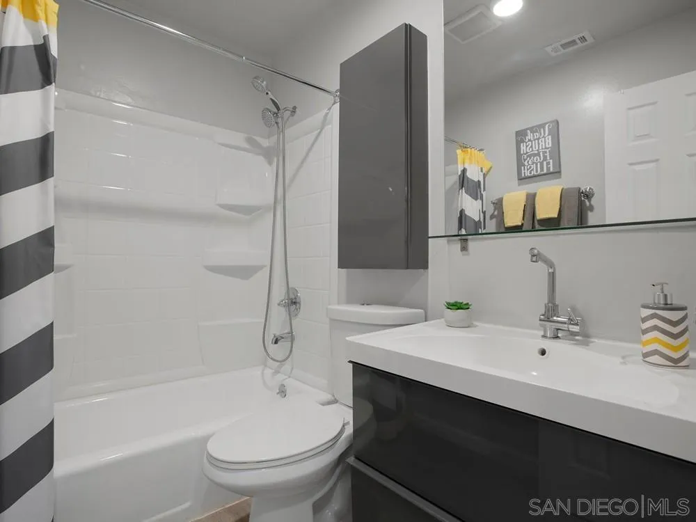 13730 Somerset Road Poway, CA 92064 - Photo 23 of 24 a bathroom with a sink a toilet and shower