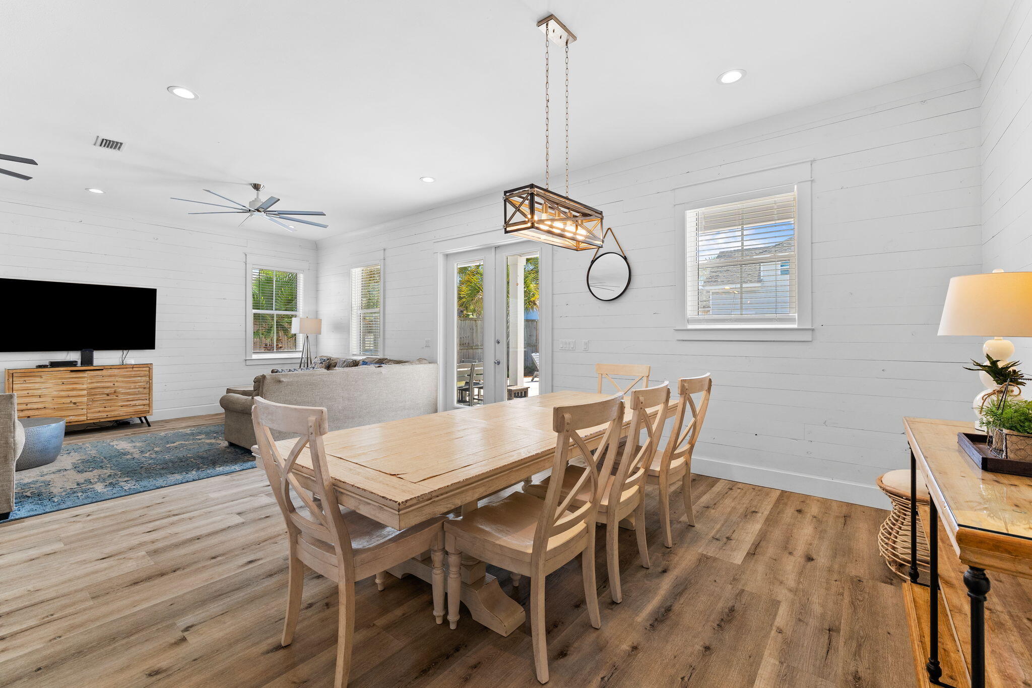 106 Shirah Street Destin, FL 32541 - Photo 11 of 91 a view of a dining room with furniture and wooden floor