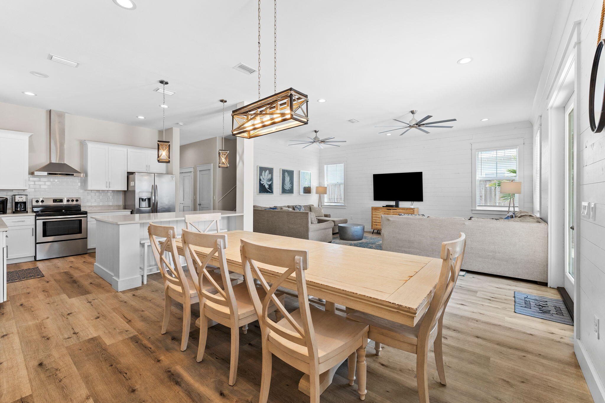 106 Shirah Street Destin, FL 32541 - Photo 12 of 91 a view of a dining room with furniture and a kitchen