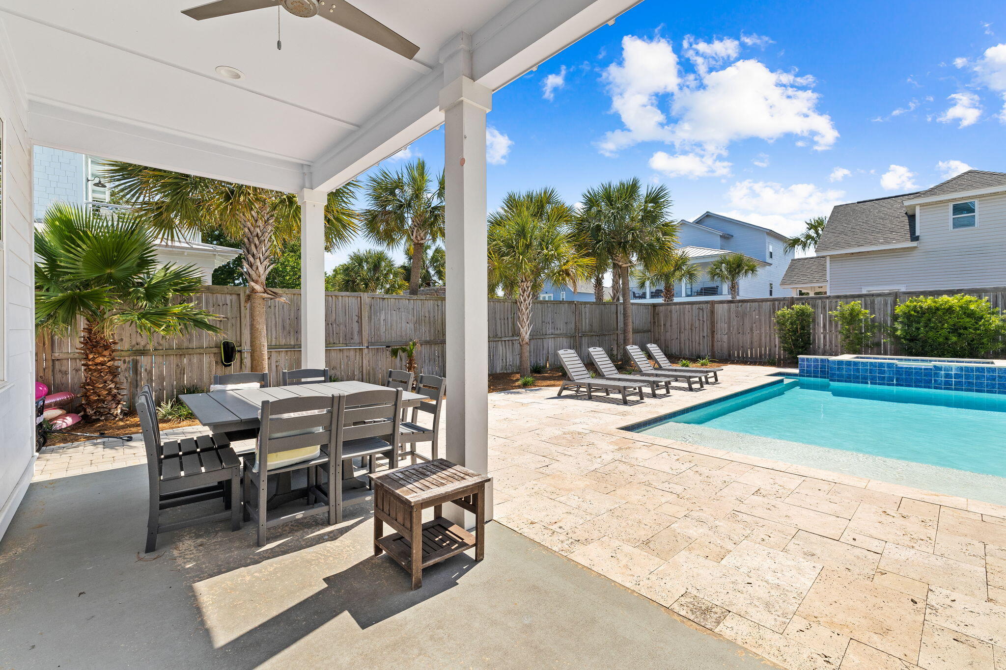 106 Shirah Street Destin, FL 32541 - Photo 26 of 91 a building outdoor space with patio furniture and potted plants