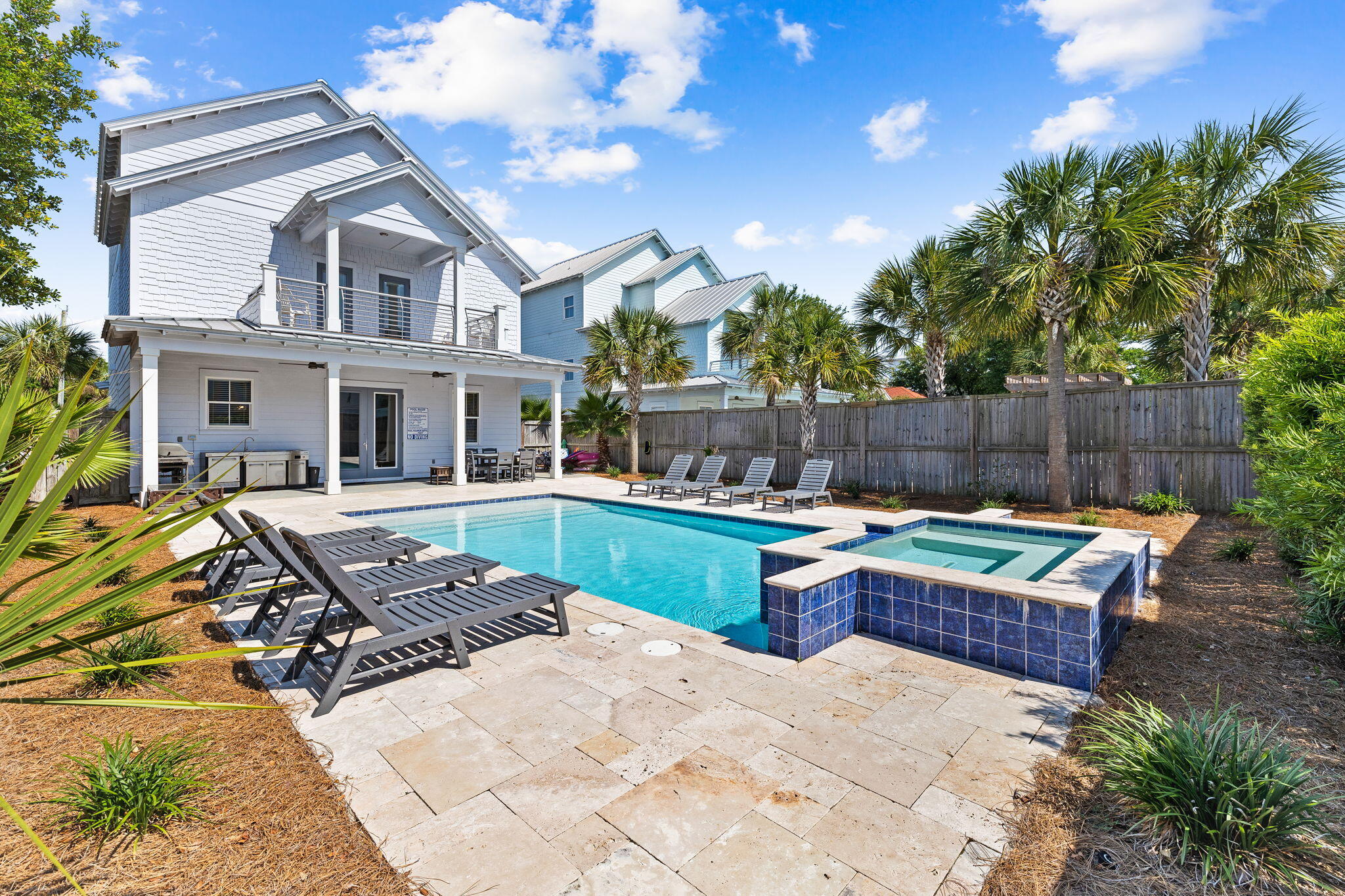 106 Shirah Street Destin, FL 32541 - Photo 4 of 91 a view of a house with backyard and sitting area