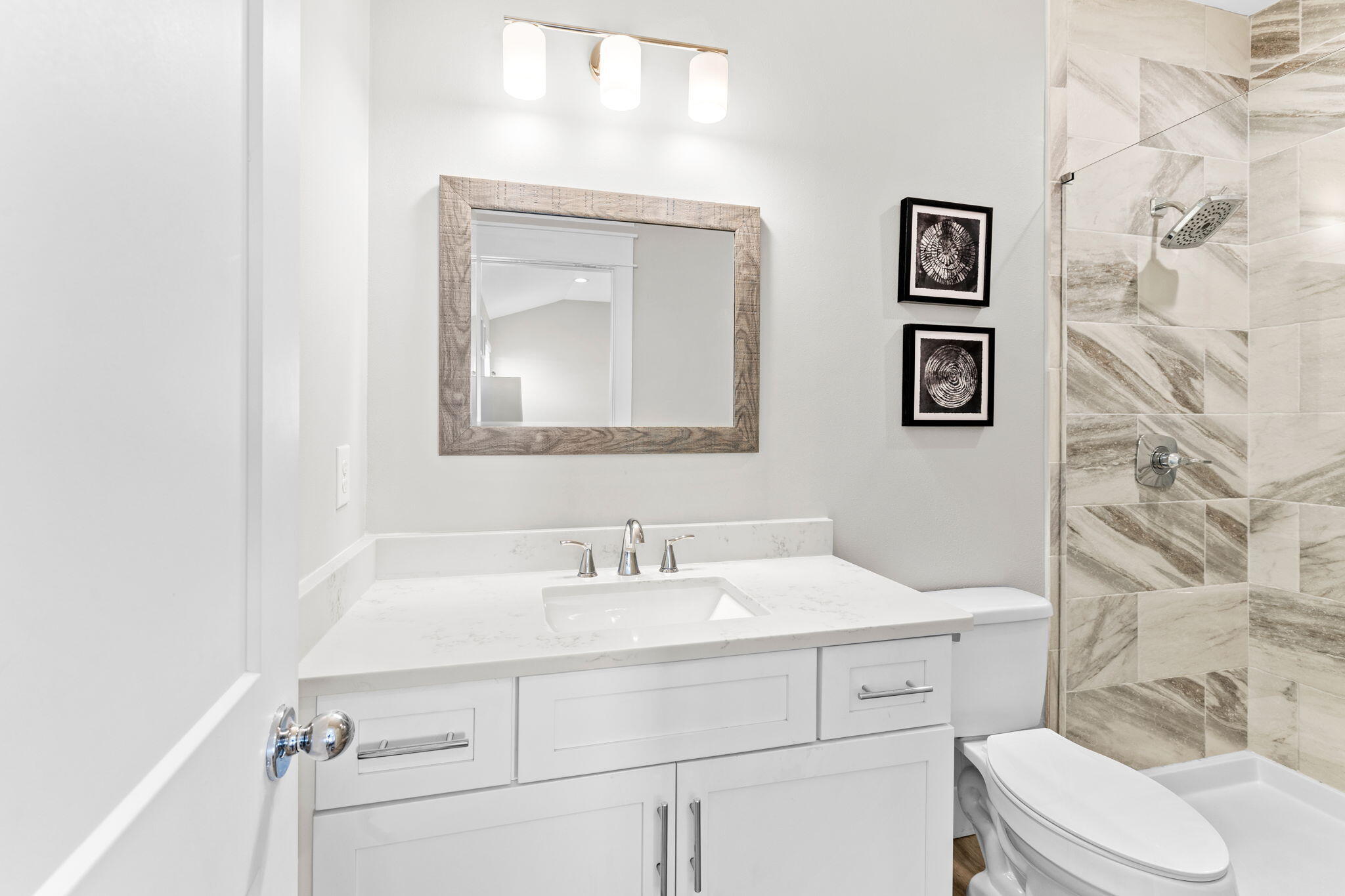 106 Shirah Street Destin, FL 32541 - Photo 43 of 91 a bathroom with a sink toilet and mirror