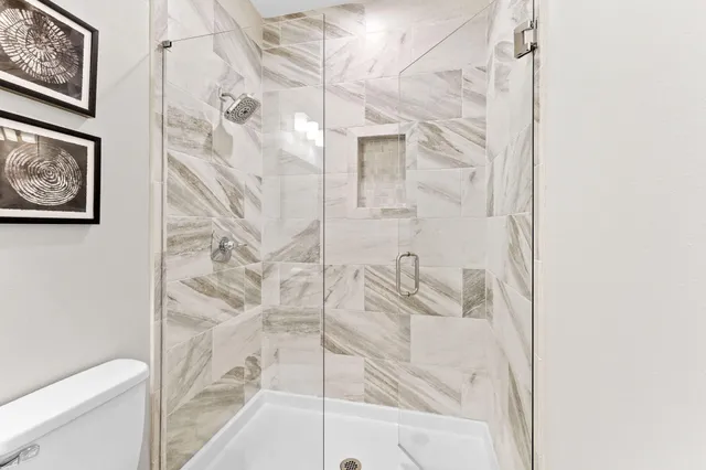 a view of a bike storage and utility room