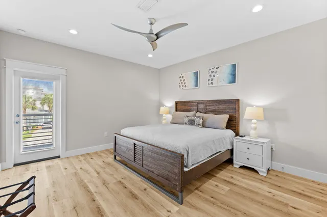 an aerial view of a house with a garden and mountain view in back