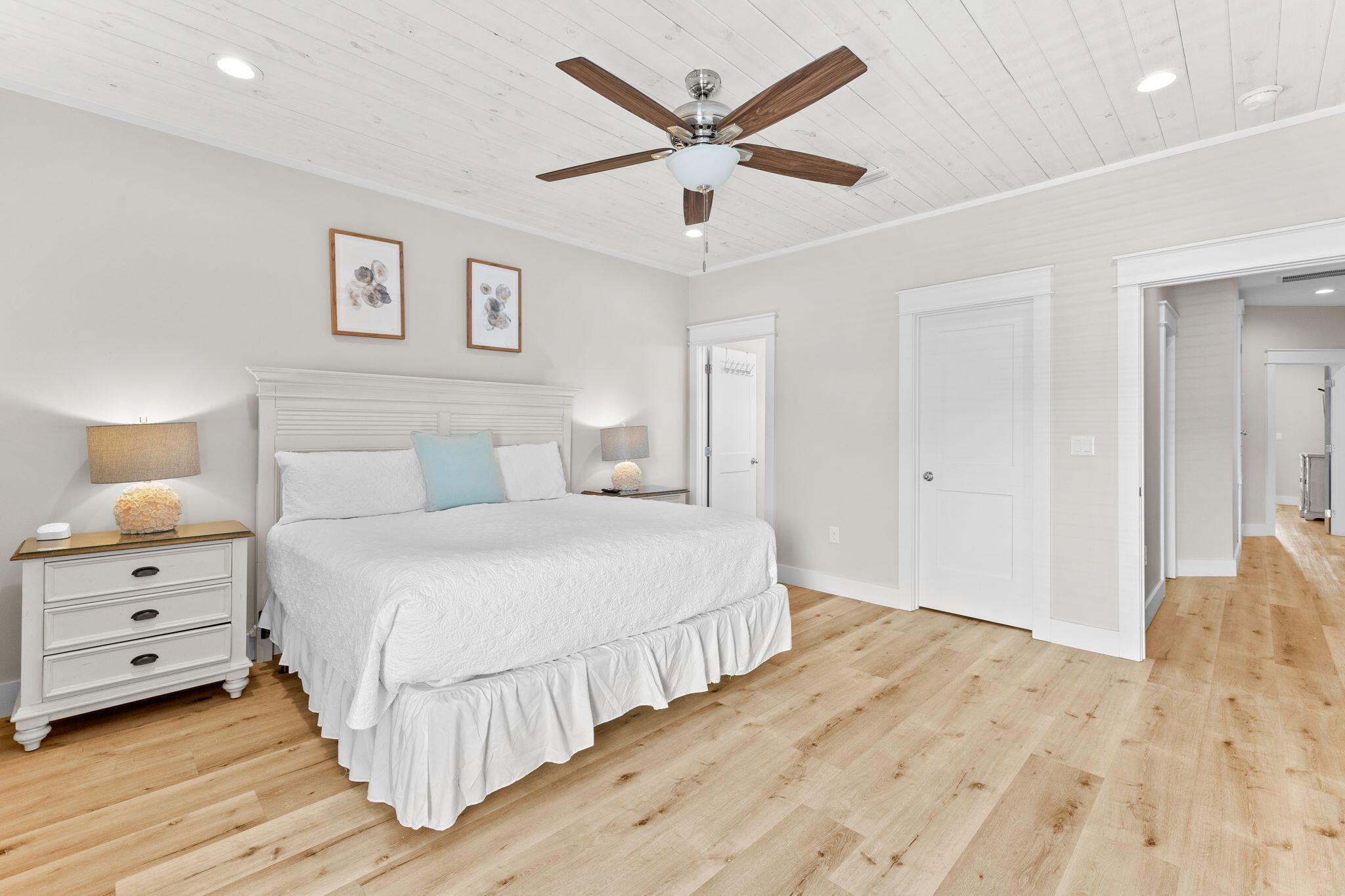 106 Shirah Street Destin, FL 32541 - Photo 54 of 91 a bedroom with a large bed and a ceiling fan