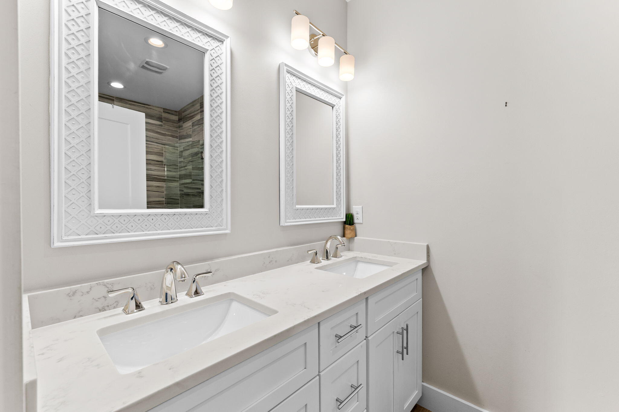 106 Shirah Street Destin, FL 32541 - Photo 61 of 91 a bathroom with a sink double vanity and a mirror