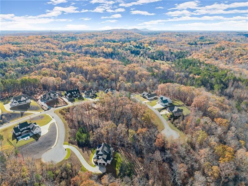 6415 Tranquillity Manor Road Dawsonville, GA 30534 - Photo 11 of 25 an aerial view of multiple house