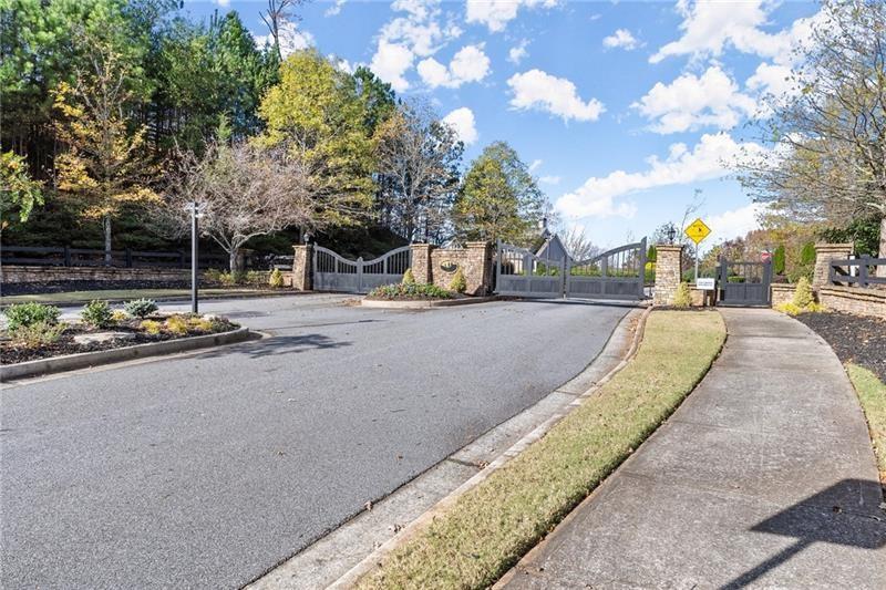 6415 Tranquillity Manor Road Dawsonville, GA 30534 - Photo 21 of 25 a view of a street with houses