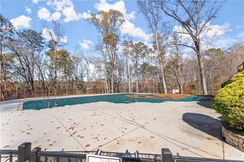 6415 Tranquillity Manor Road Dawsonville, GA 30534 - Photo 25 of 25 a view of white house with a yard