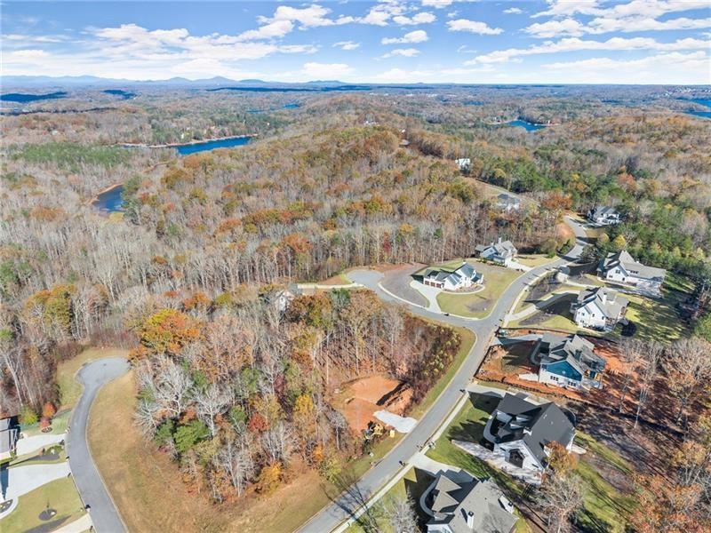 6415 Tranquillity Manor Road Dawsonville, GA 30534 - Photo 7 of 25 an aerial view of residential houses with outdoor space