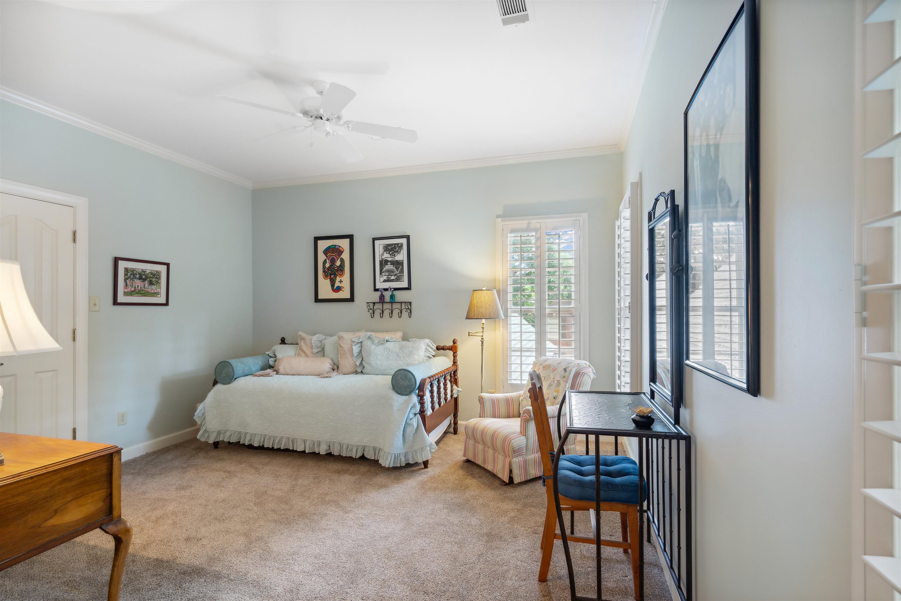 3536 Walnut Grove Road Memphis, TN 38111 - Photo 12 of 18 a bedroom with a bed and a couch