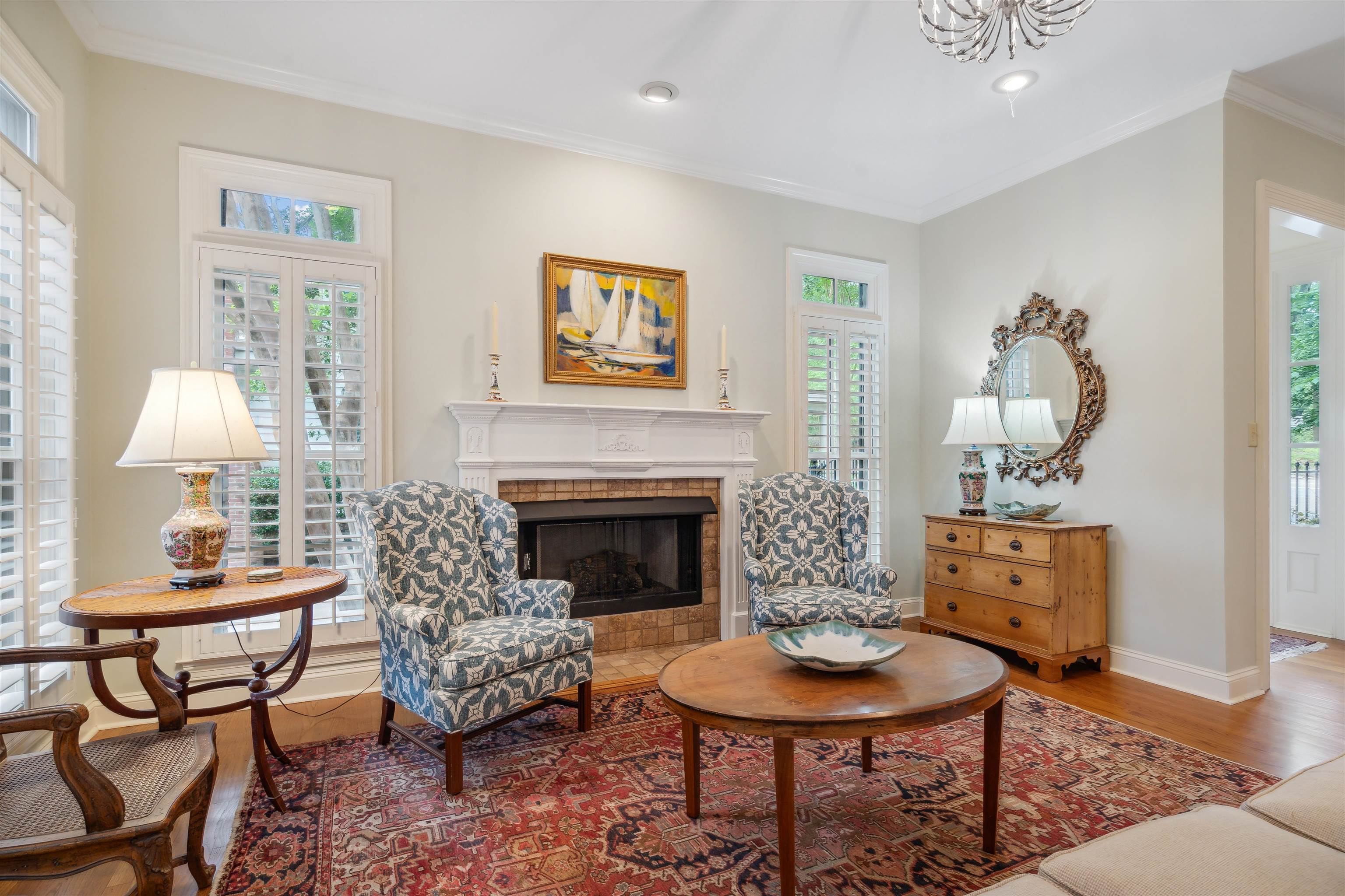 3536 Walnut Grove Road Memphis, TN 38111 - Photo 8 of 18 a living room with furniture a fireplace and a table