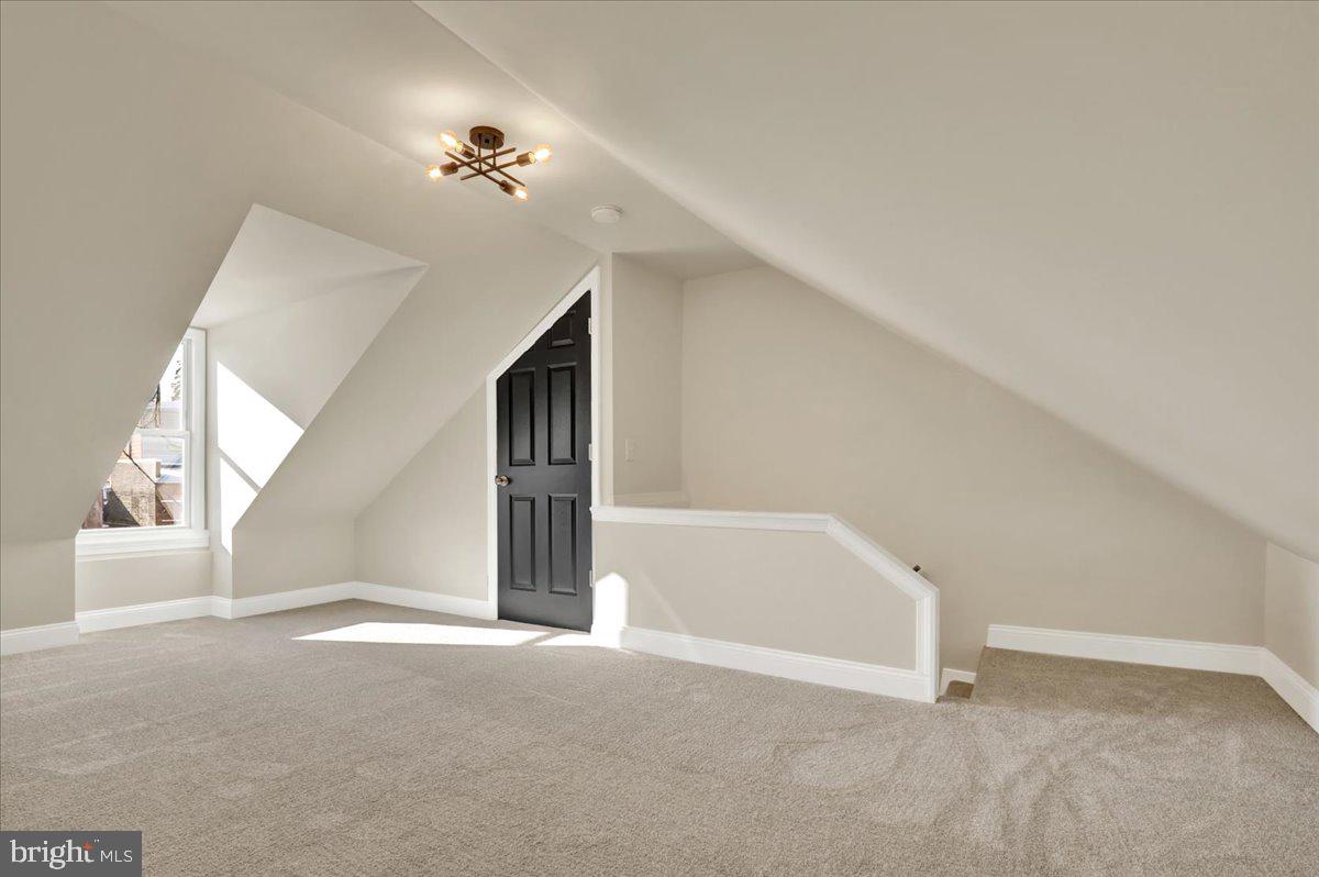 623 Bay Street Lancaster, PA 17603 - Photo 20 of 23 a view of a big room with windows and chandelier fan