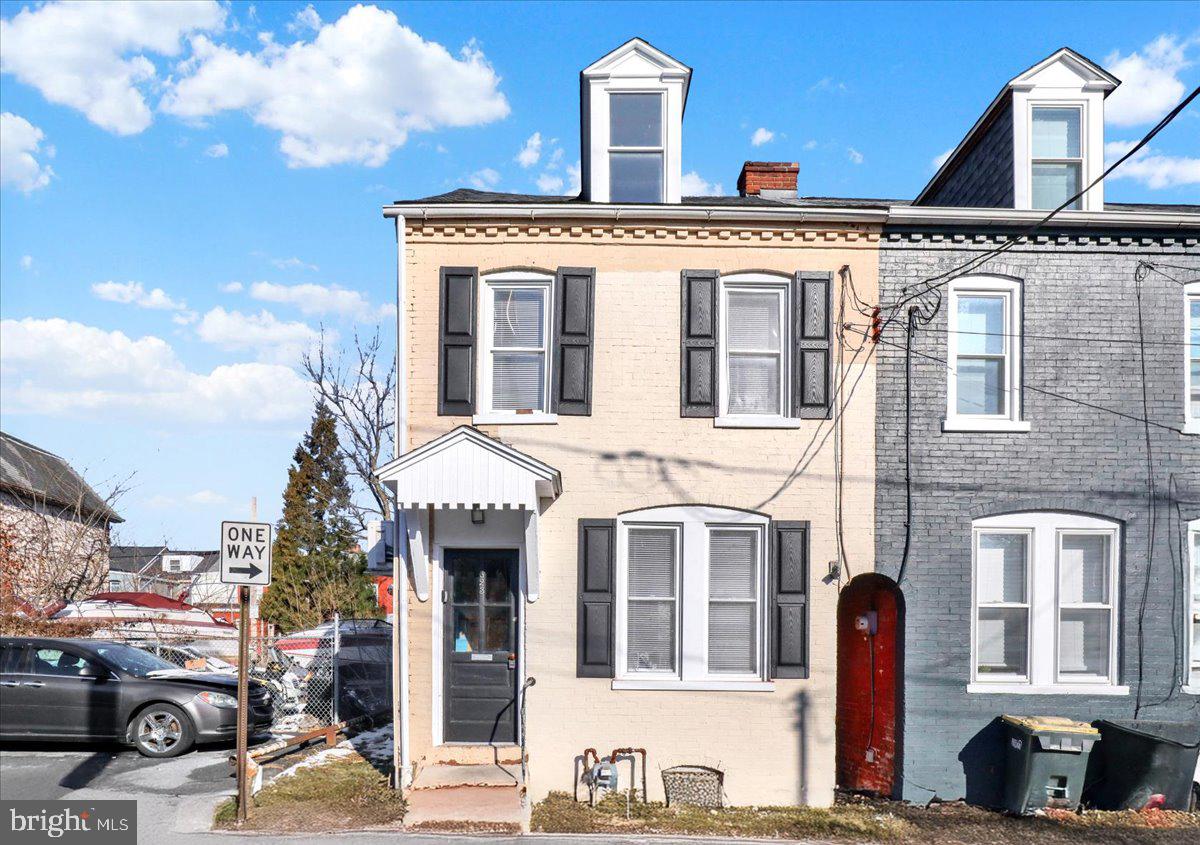 623 Bay Street Lancaster, PA 17603 - Photo 2 of 23 a front view of a building with lot of cars and trees