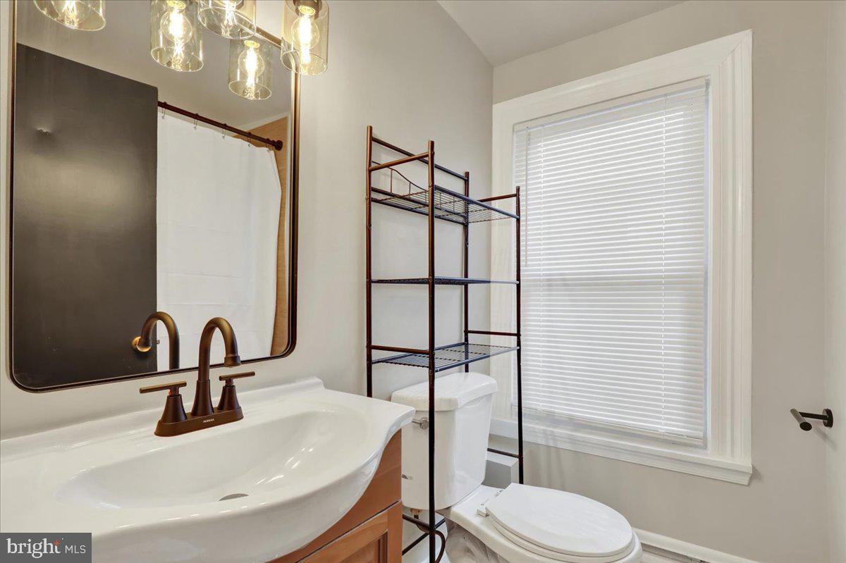 623 Bay Street Lancaster, PA 17603 - Photo 10 of 23 a bathroom with a sink toilet and shower