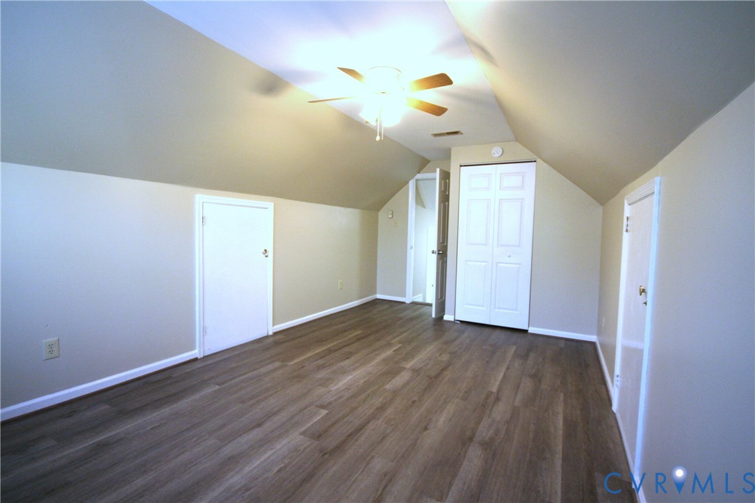 12141 Old Buckingham Road Midlothian, VA 23113 - Photo 19 of 39 Room featuring sloped ceilings, wood-finish floori