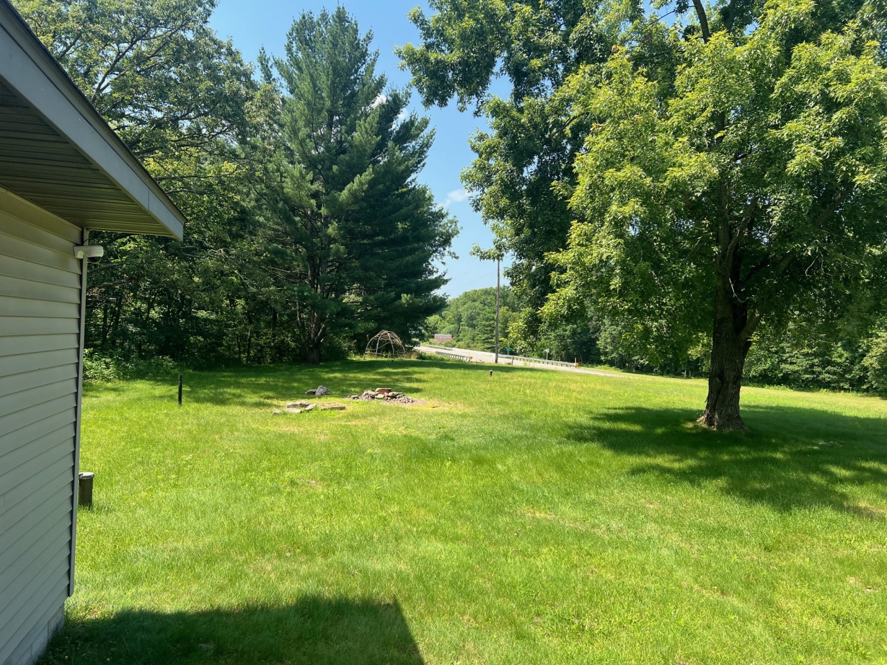 N5488 Highway 54 Albion, WI 54615 - Photo 36 of 46 Front Yard firepit space