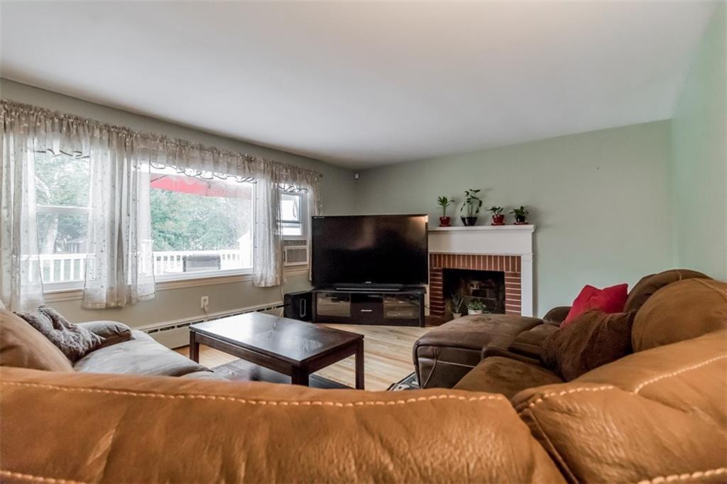 5 Pinewood Drive Cumberland Center, ME 04021 - Photo 11 of 35 Living room with picture window and...