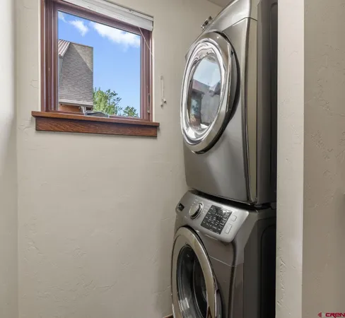a view of washer and dryer in a utility room