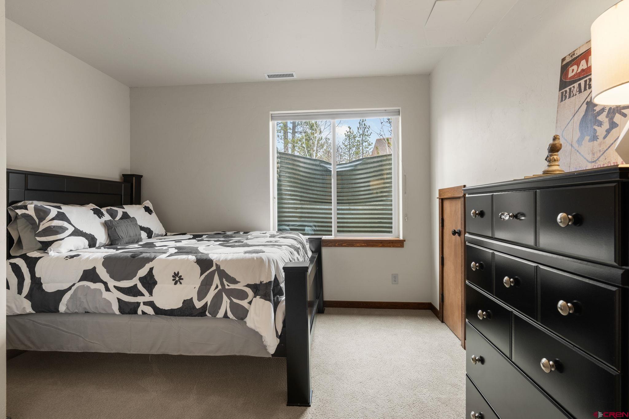 212 Copper Rim Trail, Unit B Durango, CO 81301 - Photo 28 of 42 Downstairs bedroom