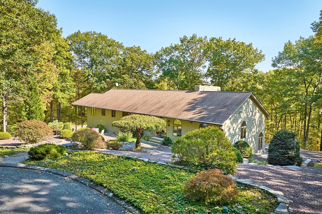 72 Crooked Ledge Road Southampton, MA 01073 - Photo 1 of 42 a view of a house with a yard and sitting area
