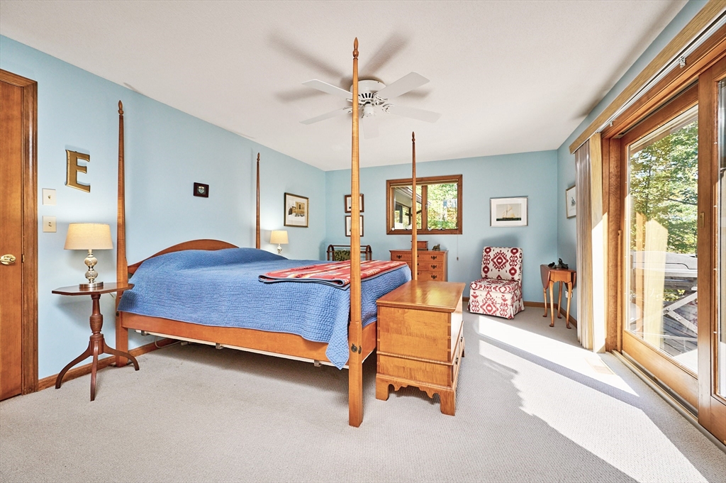 72 Crooked Ledge Road Southampton, MA 01073 - Photo 22 of 42 a bedroom with a bed and a large window