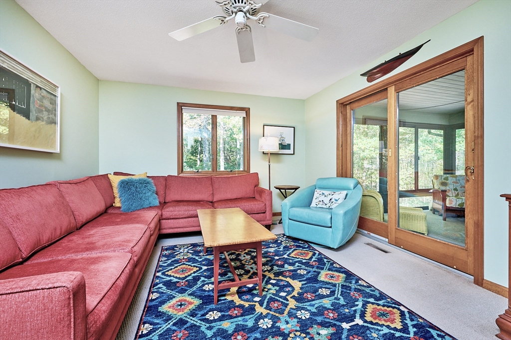 72 Crooked Ledge Road Southampton, MA 01073 - Photo 25 of 42 a living room with furniture and a large window