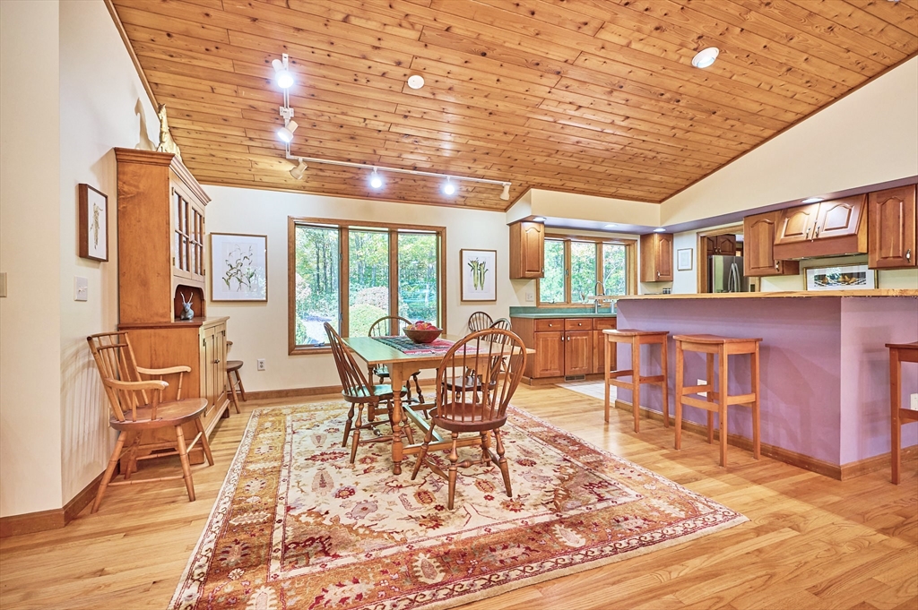 72 Crooked Ledge Road Southampton, MA 01073 - Photo 8 of 42 a dining room with wooden floor and large windows