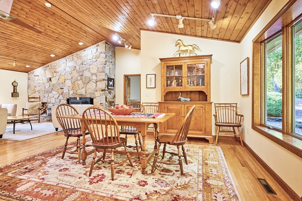72 Crooked Ledge Road Southampton, MA 01073 - Photo 10 of 42 a dining room with furniture a rug and wooden floor