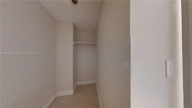 a view of lobby with furniture and large windows