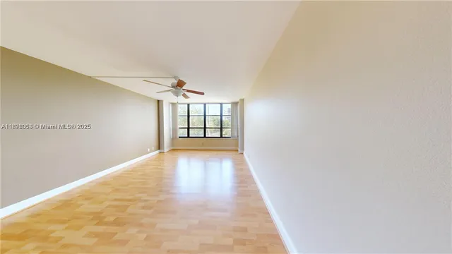 a view of livingroom with hardwood floor and window