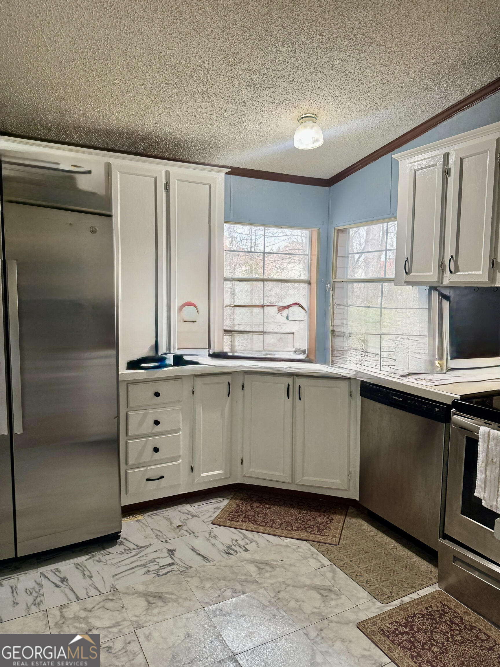 29 Settlement Road Dallas, GA 30132 - Photo 3 of 13 a kitchen with granite countertop a refrigerator and window