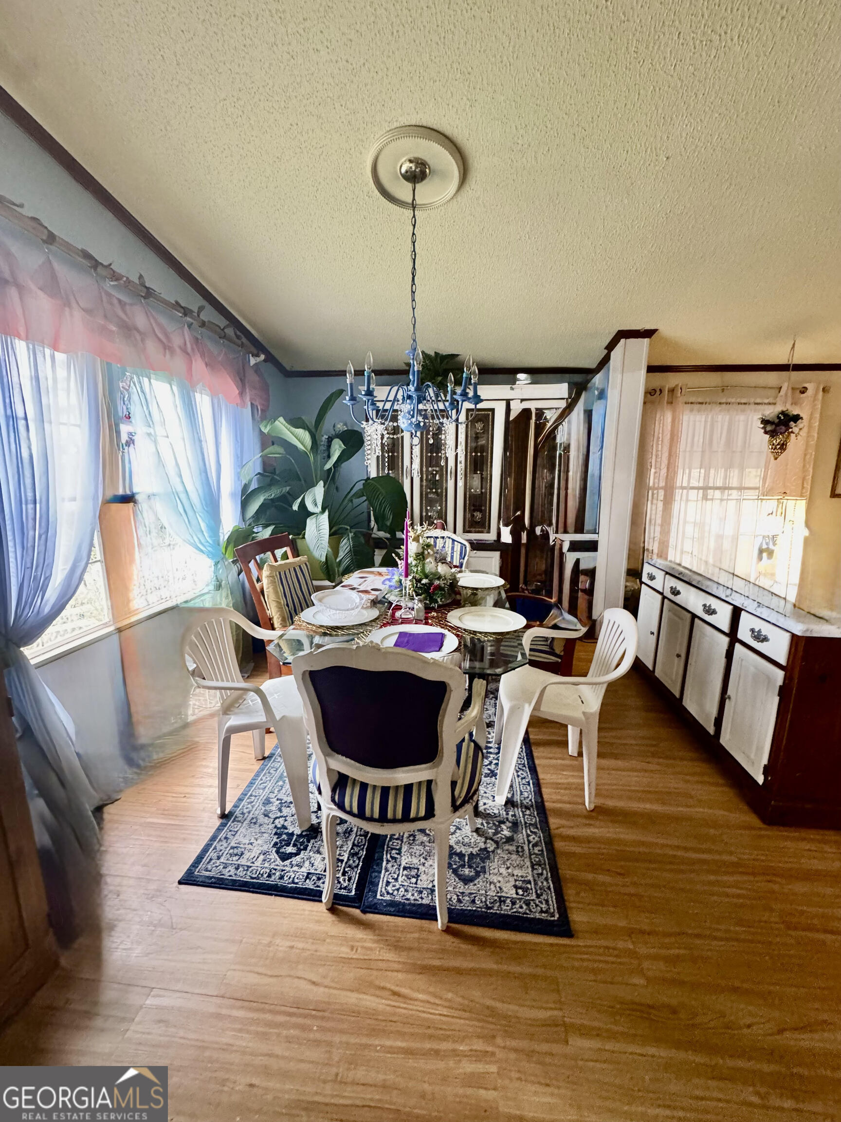 29 Settlement Road Dallas, GA 30132 - Photo 4 of 13 a view of a dining room with furniture window and wooden floor